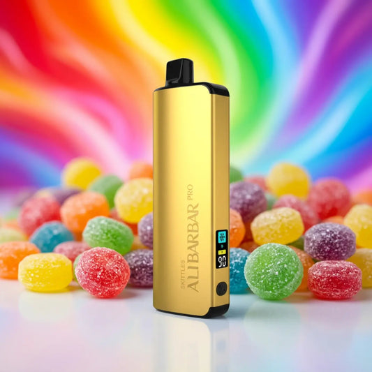 Gold-colored aluminum alibarbar pro vape pen with black top and digital display for ice adjust skittles flavor